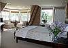 Additional view of the spacious master bedroom.
