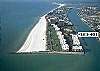 This tropical paradise rests on a quiet beach with a winding boardwalk that encompasses the property.