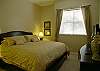 Master bedroom with super plush king size bed! Adjoining bath with oversize tub/shower, double vanity & walk-in closet.