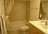 Second bath with beautiful tile and tub/shower.