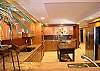 The  spacious kitchen has the best of everything....high end appliances and cabinetry and granite counter tops.