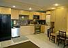 Beautiful new kitchen with gourmet stainless steel range, microwave, dishwasher, full size side by side refrigerator and a stacking washer/dryer!