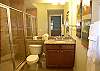 Guest bath with tile shower.