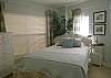 Guest Bedroom with queen size bed and adjoining bath.