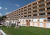 View of the building and BBQ area from the beach side.