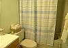 Guest bath with tub/shower.