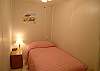 Twin bed in the alcove