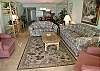 Living area with queen size sofa bed.