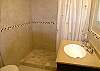 Updated bathroom with new tile shower & granite topped vanity.