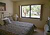 New queen size bed, cable TV and adjacent bath with tub/shower.