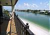 Doesn't this look like a great place to relax, watch the boats and dolphins, or take a nap on the lounger.