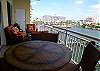 Panoramic views of Clearwater Harbor from the wide balcony spanning the entire width of the living room and master bedroom.