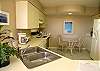 Roomy, eat-in kitchen with a pass-through to the dining area.
