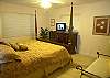 The master bedroom has a beautiful king size bed, cable TV and adjoining bath with a door to the private garden.