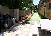 Central Gulf Coast Condominium rental - Interior Photo - BBQ & Shuffleboard Court