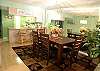 New dining table with four chairs and a double bench and 2 bar stools at the counter.