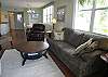 Corner Living Room with sleeper sofa & leather recliner