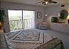 King size bed in the master bedroom, cable TV, an adjoining bath with tub/shower and a small balcony with angled view to the Gulf.