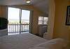 Upstairs Gulf Front bedroom with queen bed & TV/DVD