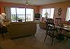 Living/Dining area with Gulf views from the sliding glass doors and windows!