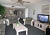 The living room has a Gulf front balcony, new plasma TV/DVD/VCR &amp; Stereo CD.