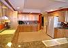 Expansive kitchen with granite countertops