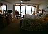 Gulf front Master bedroom with balcony, king sized bed, LCD TV and adjoining bath.