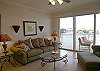 Central Gulf Coast Condominium rental - Interior Photo - Living Room with Bayside Balcony