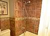 Master bath tub/shower.