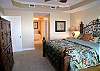 Master bedroom with king size bed, bay side balcony & 37 inch LCD TV/DVD/VCR.