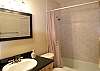 Bathroom with tub/shower.