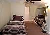 Upstairs bedroom with twin beds