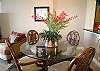 Large dining table with 6 chairs (2 in bedrooms).