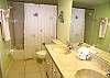 Guest bath with double vanity & tub/shower.
