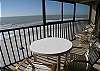Sunny, screened balcony.