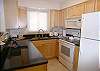 Well appointed kitchen with maple cabinets &amp; granite countertops