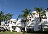 Building Exterior: Unit 209 is on the upper floor, first balcony from the right.