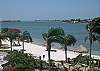 Foot bridges and walkways take you  to the sandy beach with benches and shaded seating areas.