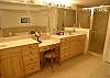 Master bath with double vanity, oversized shower and soaking tub.