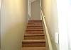 Stairway to the upper bedroom & bath