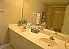 Master bath with double vanity and oversized tub/shower.