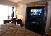 The master bedroom has a desk with Gulf view and computer printer and the armoire contains a 32 inch LCD TV/DVD.