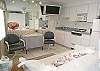 This condo is just one back from being beachfront and has a new flatscreen TV!