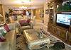 Living room with magnificent, decorator furnishings, 42 inch LCD TV/DVD and Gulf front balcony!