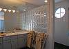 Upper level guest bath with walk-in shower.