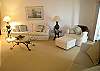 Living area with sofa and loveseat are both sleepers.