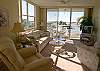 The corner living area has large windows and sliding glass doors to take full advantage of the outstanding views!
