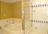 There is a separate tub and stand up shower.