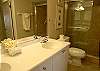 Master bath with double vanity & new tile shower.