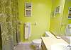 Guest bath with tub/shower.
